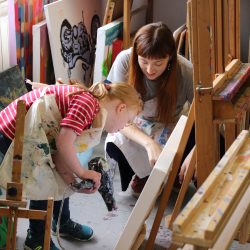 Volunteer Corah Ambrose supporting young artist