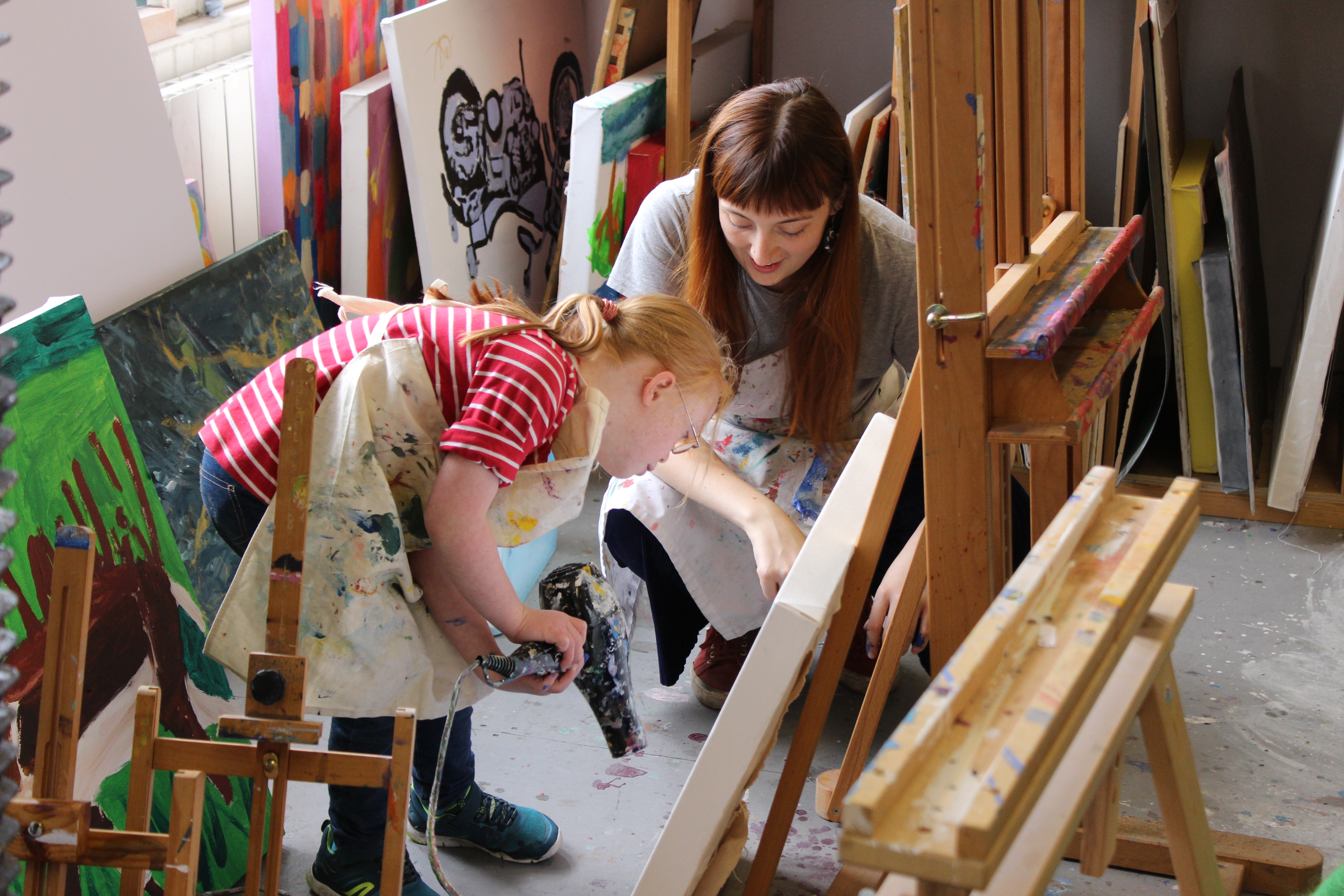 Volunteer Corah Ambrose supporting young artist