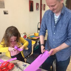making paper wigs at project ability, merchant city festival