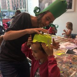 making paper wigs at project ability, merchant city festival