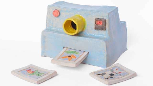 ceramic camera with polaroids