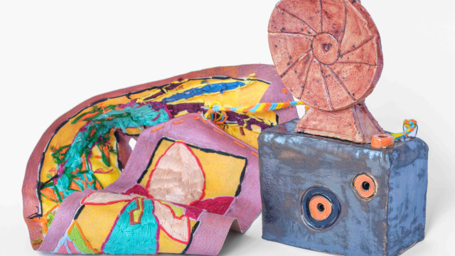 ceramic camera with embroidered strap